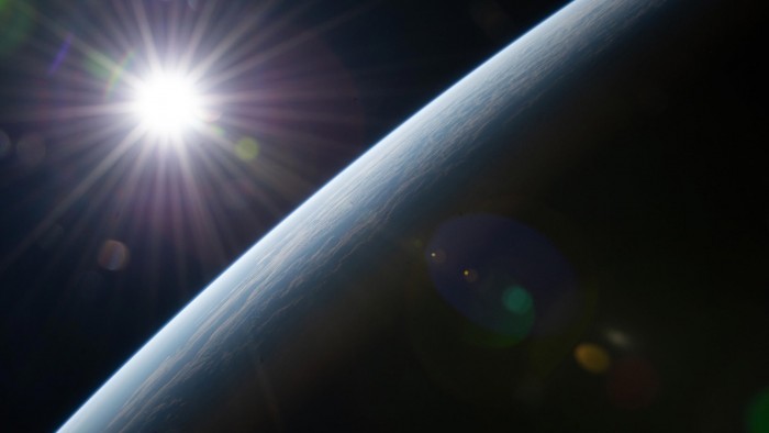 Suns-Rays-Burst-Above-Earths-Horizon-scaled.jpg